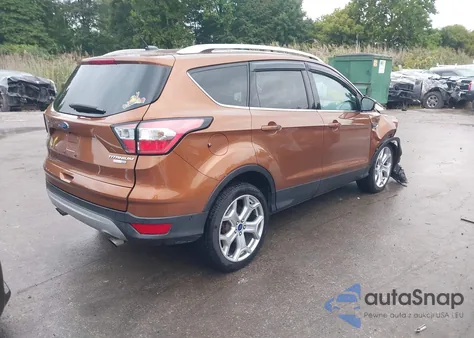 2017 Ford Escape Titanium z USA, uszkodzony, nr VIN 1FMCU9J99HUE29043